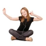 Girl dancing with earbuds