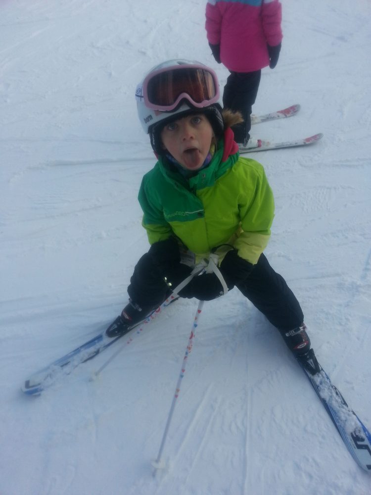 Silly kid skiing
