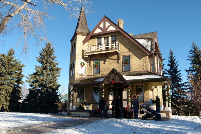 The park's heritage buildings are lovely in their holiday best.