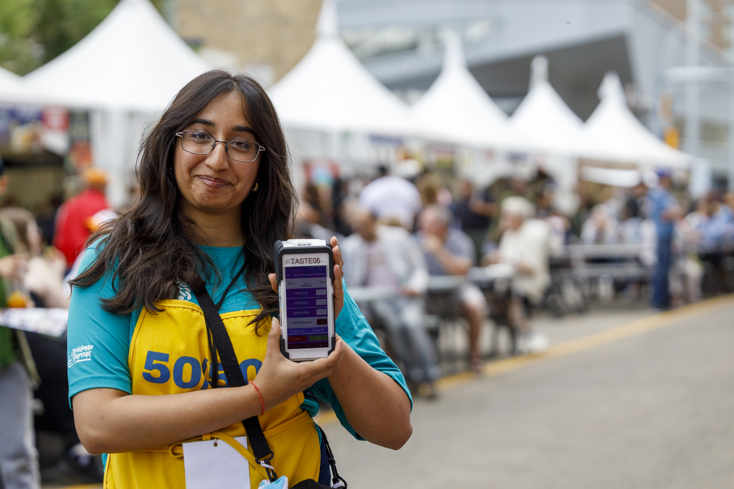 Girl Selling 5050 at Taste of Edmonton (Family Fun Edmonton)