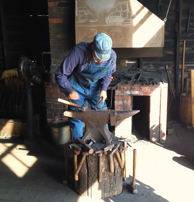 A Blacksmith at Work in the Ukrainian Cultural Heritage Village 