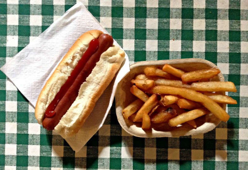 Hot dog and fries on a checkered tablecloth, taken at Hatfield Farm, Nova Scotia. Photo credit: Helen Earley, do not use without permission. 