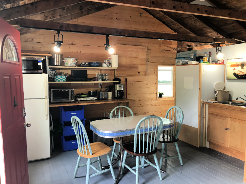 The rustic kitchen with formica table at the The Old Ten Spot, a unique Nova Scotia Air BnB