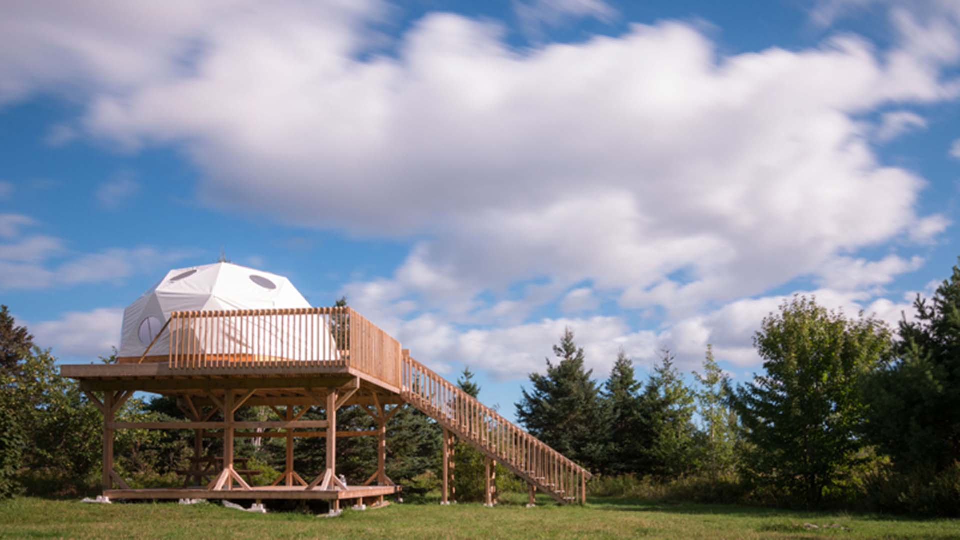 Geodesic dome in Cape Breton Nova Scotia, bright, cloudy sky