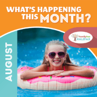 Girl with sunglasses on in a pool laying on a donut floatie