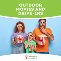 Mom, dad, and son with 3D glasses on and eating popcorn