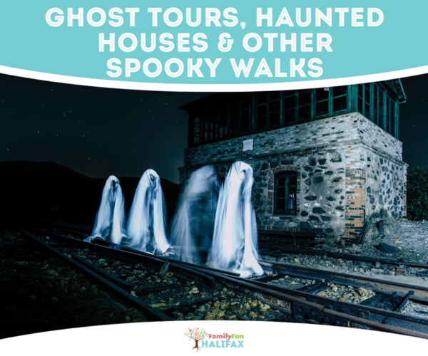 white ghosts in front of a stone building