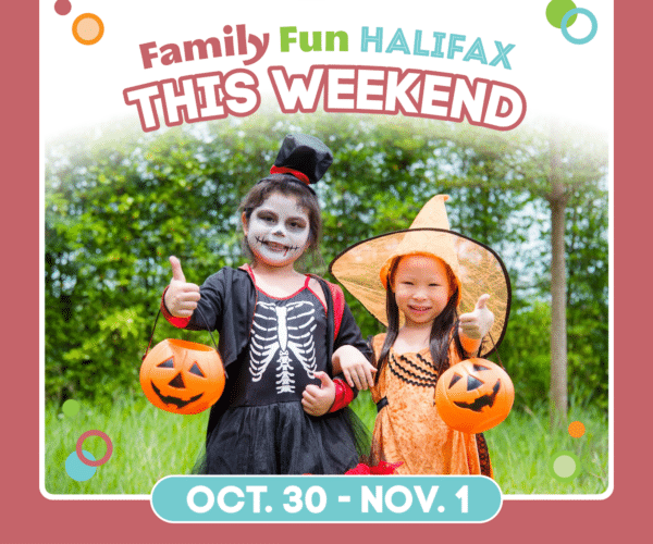 Two children in Halloween costumes holding pumpkin pails