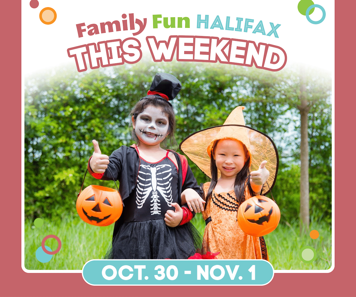 Two children in Halloween costumes holding pumpkin pails