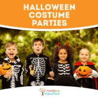 4 children dressed in Halloween costumes, three as skeletons, one as a vampire