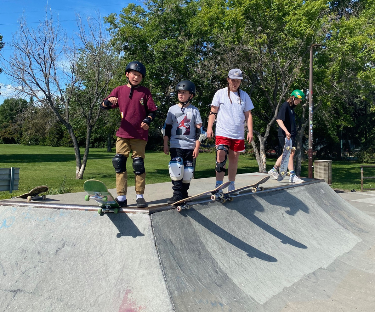 Right to Skate Summer Camps - Three Kids on Ramp.