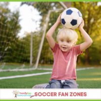 Boy holding a soccer ball in front of a net for Soccer Fan Zones 