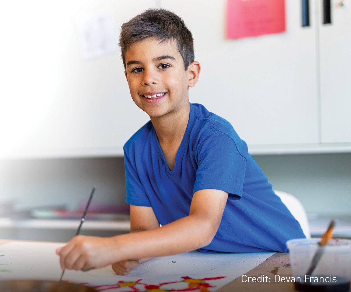 Boy creating art