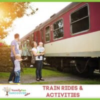 Family looking at a train