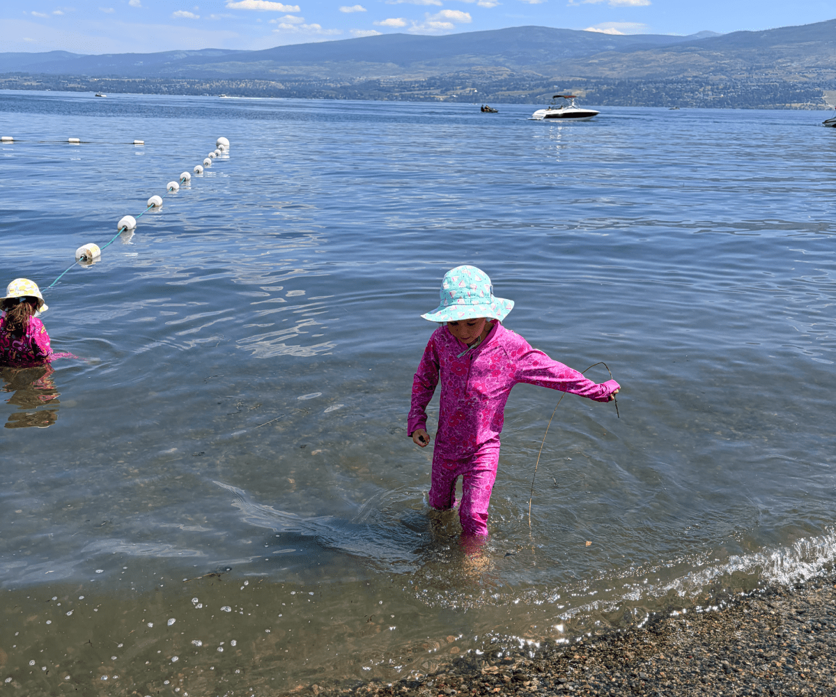 Girl swimming at a lake