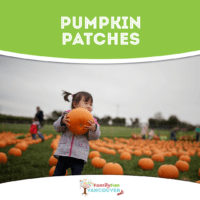Girl carrying a pumpkin
