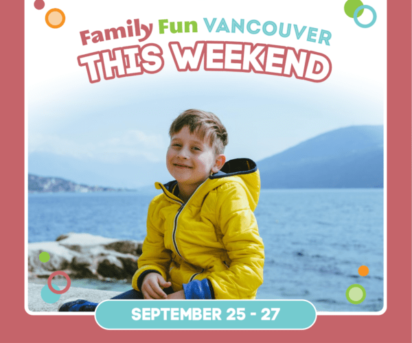 Boy in a yellow jacket sitting in front of water.
