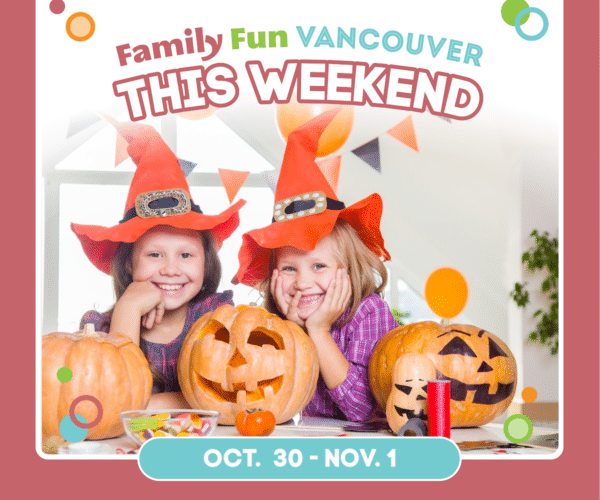 Two girls in witch hats with pumpkins