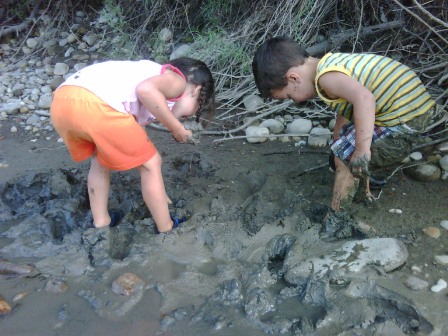 Kids playing in mud