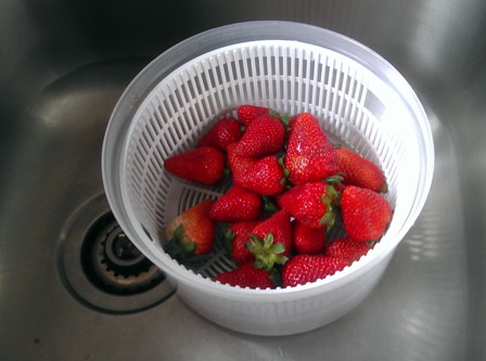 Strawberries in salad spinner - camping tips