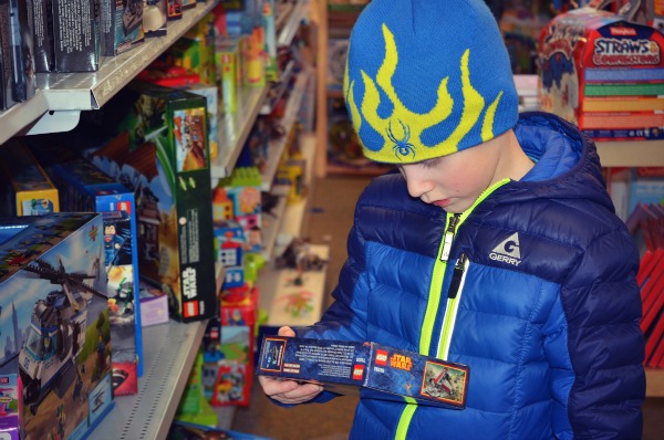 Perusing the goods at the HiJinx Toy Shop on Canmore's main street.