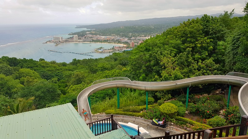 The view of Ocho Rios harbour from the restaurant lookout. The waterslide and bobsled track are in the foreground