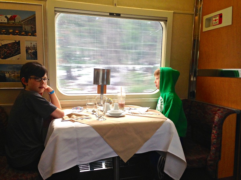 Watching the world whirl by from the train's Dining Car. So civilised! Photo Heidi Brooks