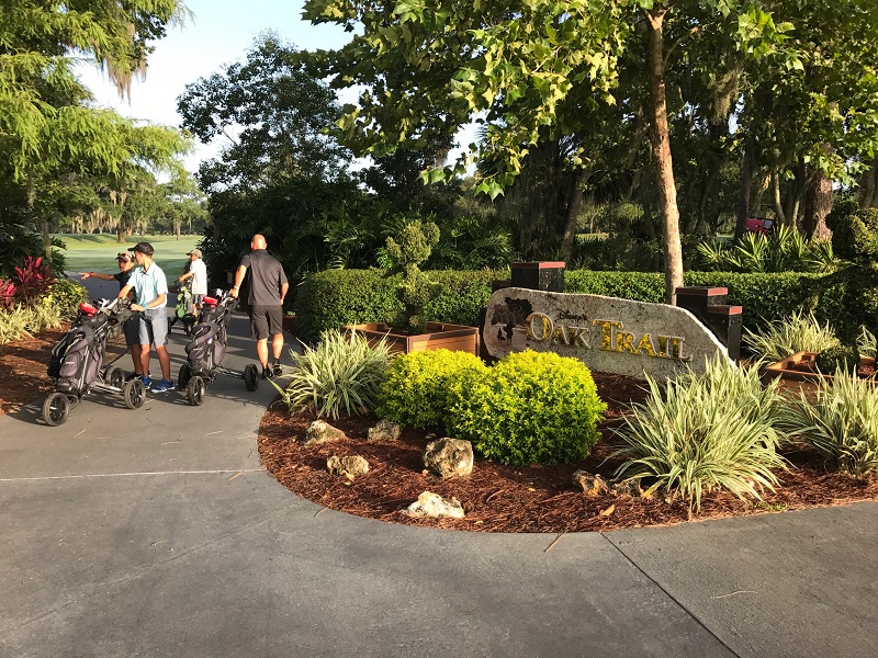 Disney Golfing - A family on their way to enjoy Disney's Oak trail. Photo Joanne Elves