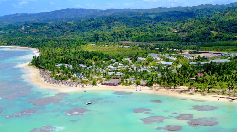 Aerial view of Grand Bahia Principe El Portillo Resort and surrounding beach and lush hills. Photo credit Bahia Principe