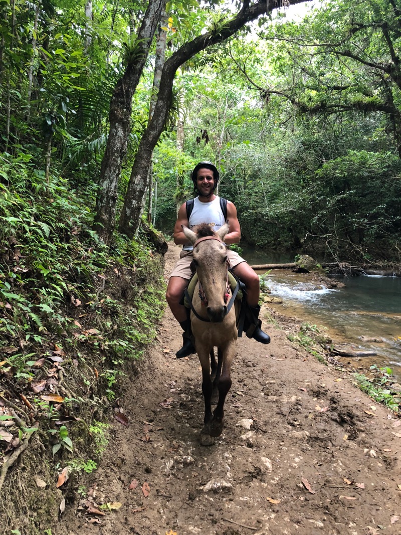 Our writer, Ivan Quintanilla, rides horseback to Salto el Limon in Samana, Dominican Republic. Photo credit Ivan Quintanilla