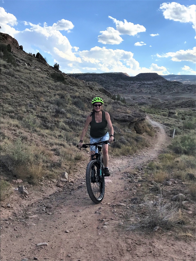 Kate mountain biking on one of the Lunch Loop trails Grand Junction Colorado