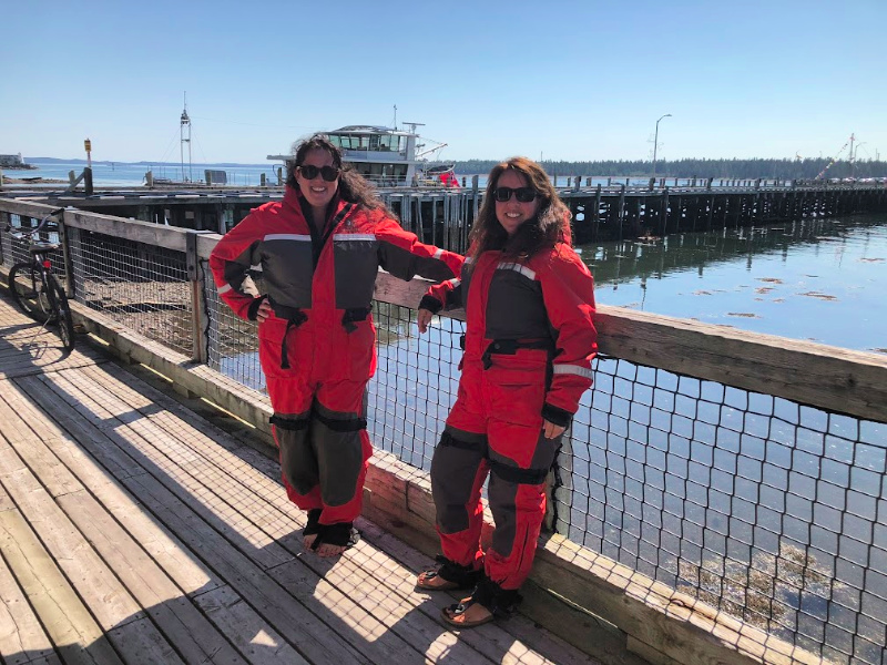 Helen Earley and Debbie Malaidack in survival suits, shortly before their jet-boat adventure/photo credit: Helen Earle