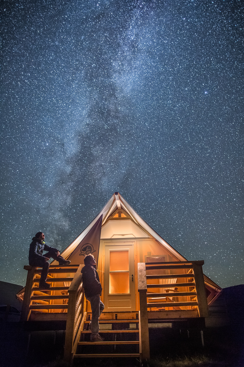 Camping with Parks Canada - Taking in the breathtaking Milky Way views at night from an oTENTik in the Dark Sky Preserve, in Grasslands National Park. Photo Parks Canada