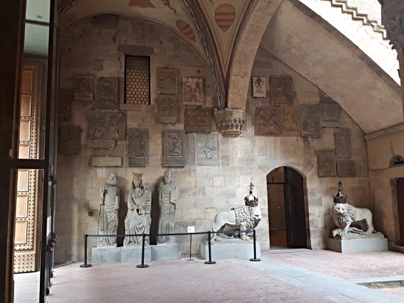 Crests of Florentine guilds in the courtyard of The Bargello Museum - photo Debra Smith