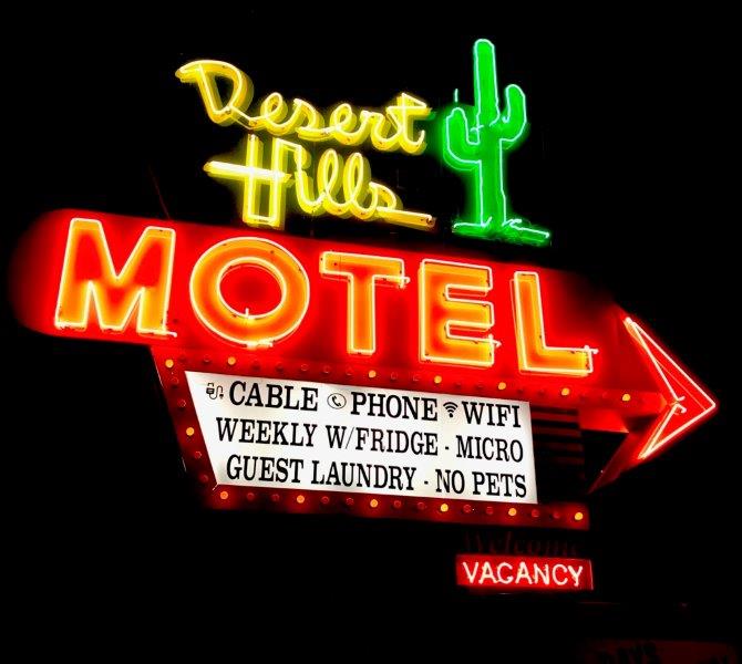 Searching for the sign of a good motel - photo by Emily Overes
